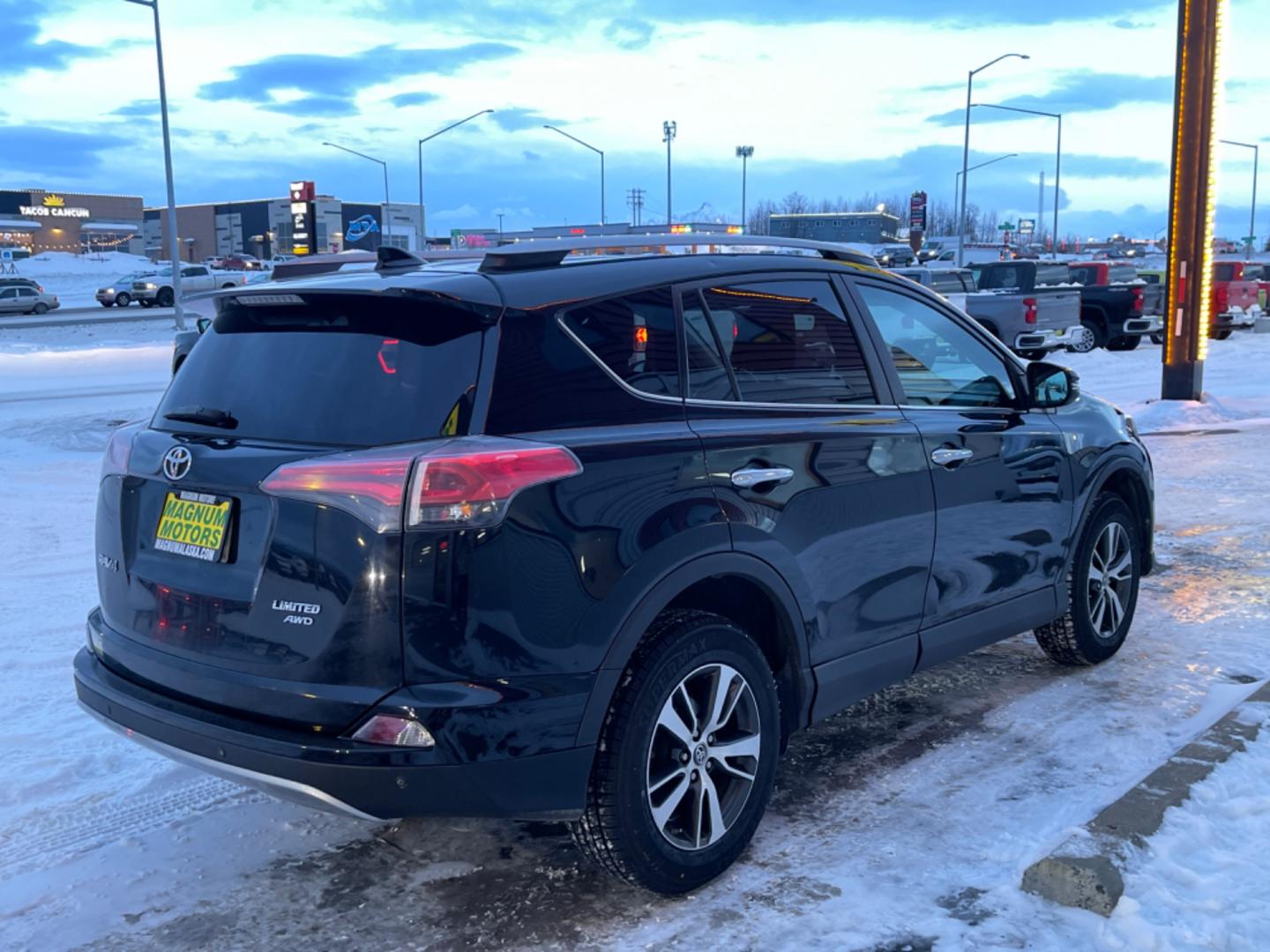 2017 Black /black leather Toyota RAV4 Limited AWD (2T3DFREV4HW) with an 2.5L L4 DOHC 16V engine, 6A transmission, located at 1960 Industrial Drive, Wasilla, 99654, (907) 274-2277, 61.573475, -149.400146 - Photo#3